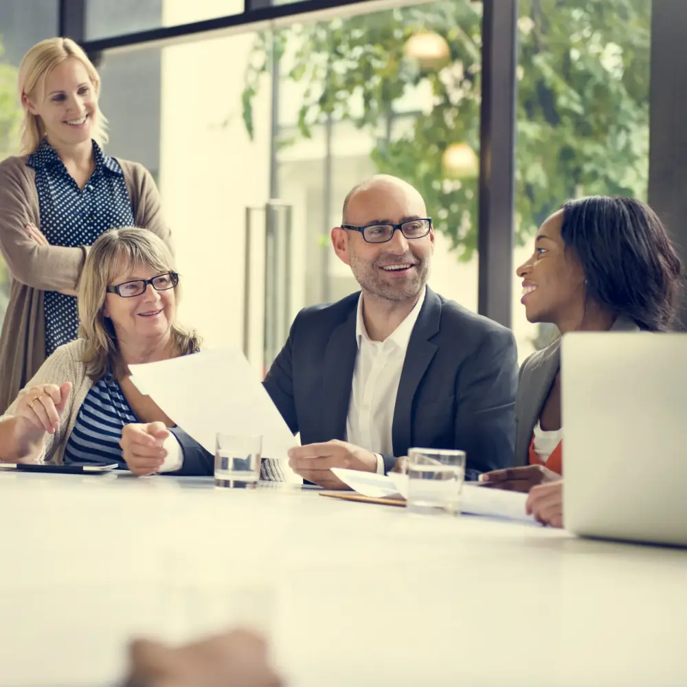Team of people in a business meeting discussing AI tools